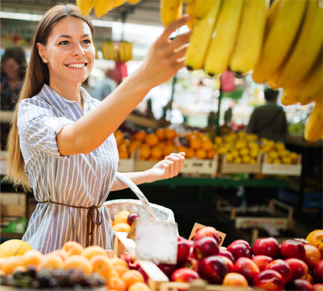 Woman selecting fresh fruits