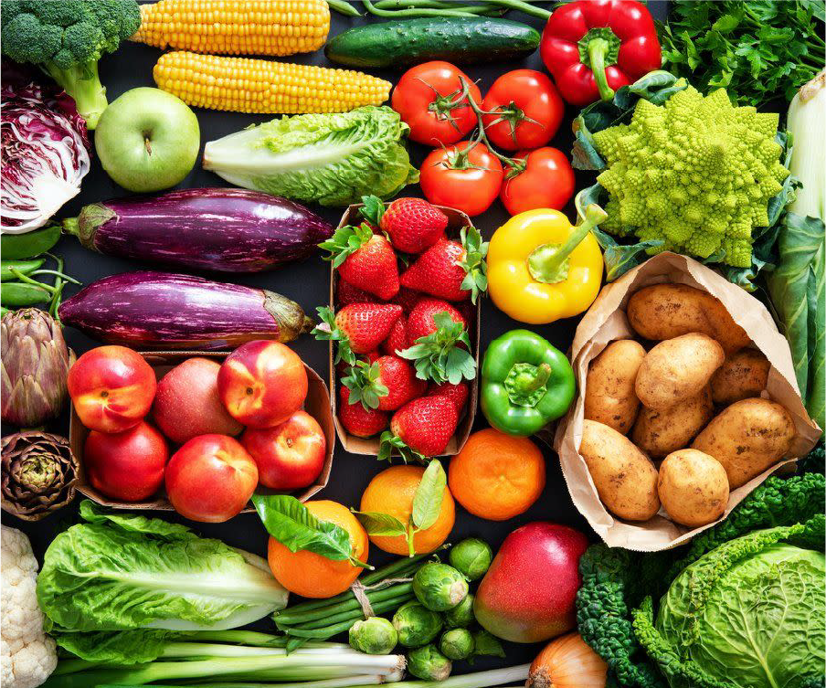 Hands holding fresh vegetables